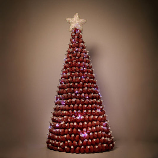 Red Christmas tree with white ornaments and white lights.