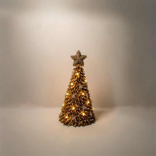 Gold christmas tree with gold lamps and gold star.